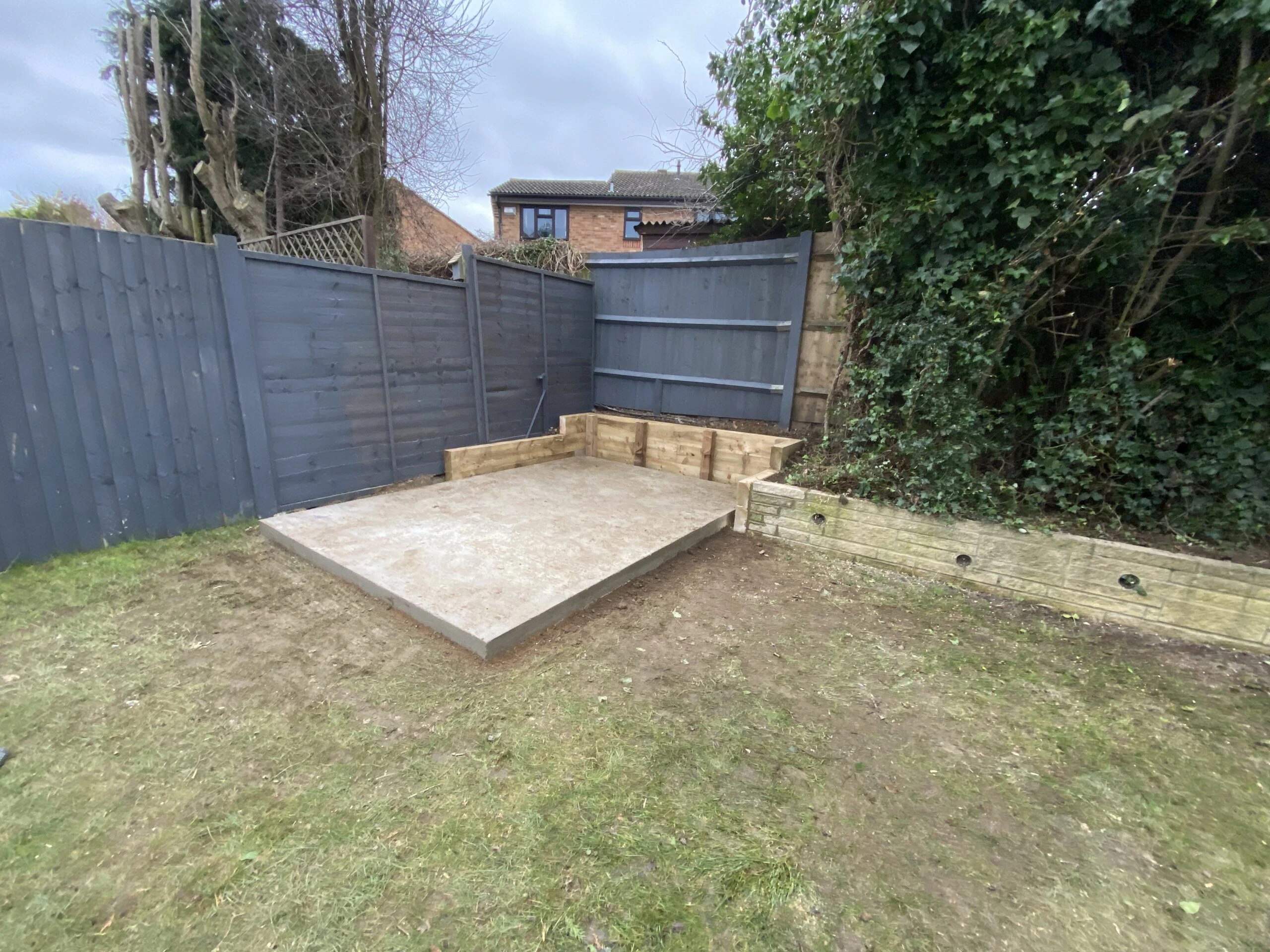 Finished concrete base for a garden shed