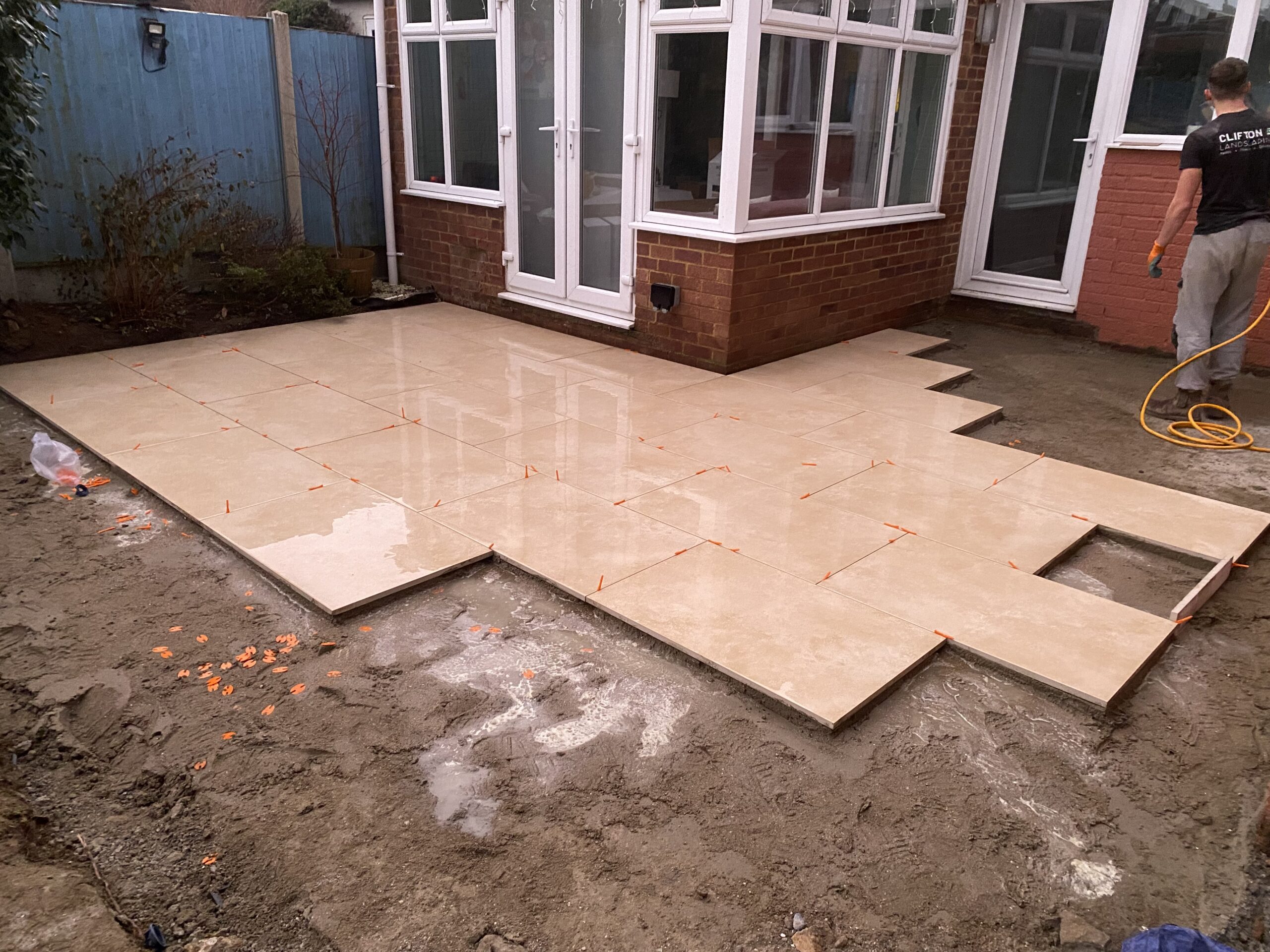 Porcelain patio installation with full mortar bed in Maidstone