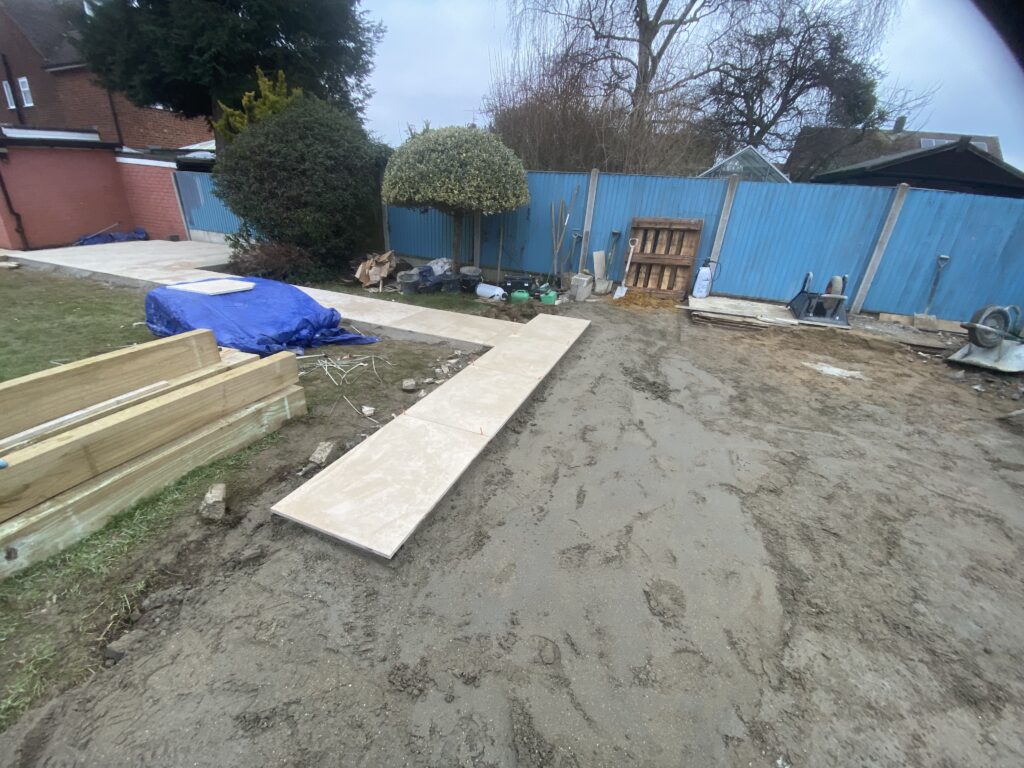 Porcelain paving installation during garden landscaping project in Maidstone