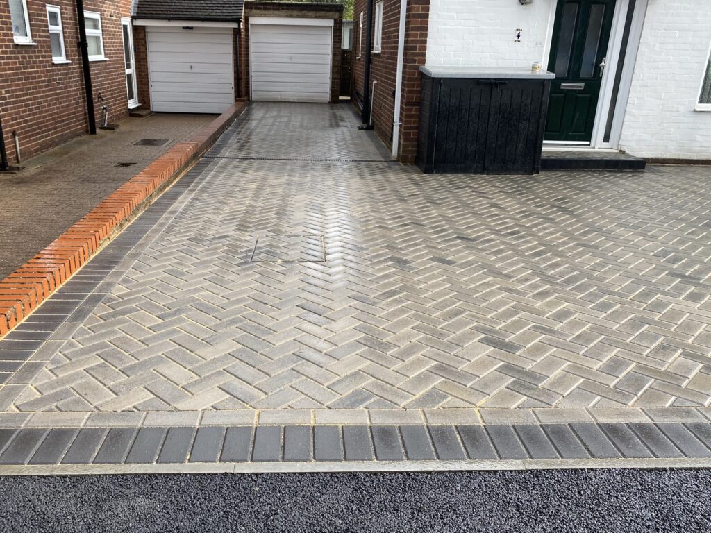 Block paving with contrasting dark border
