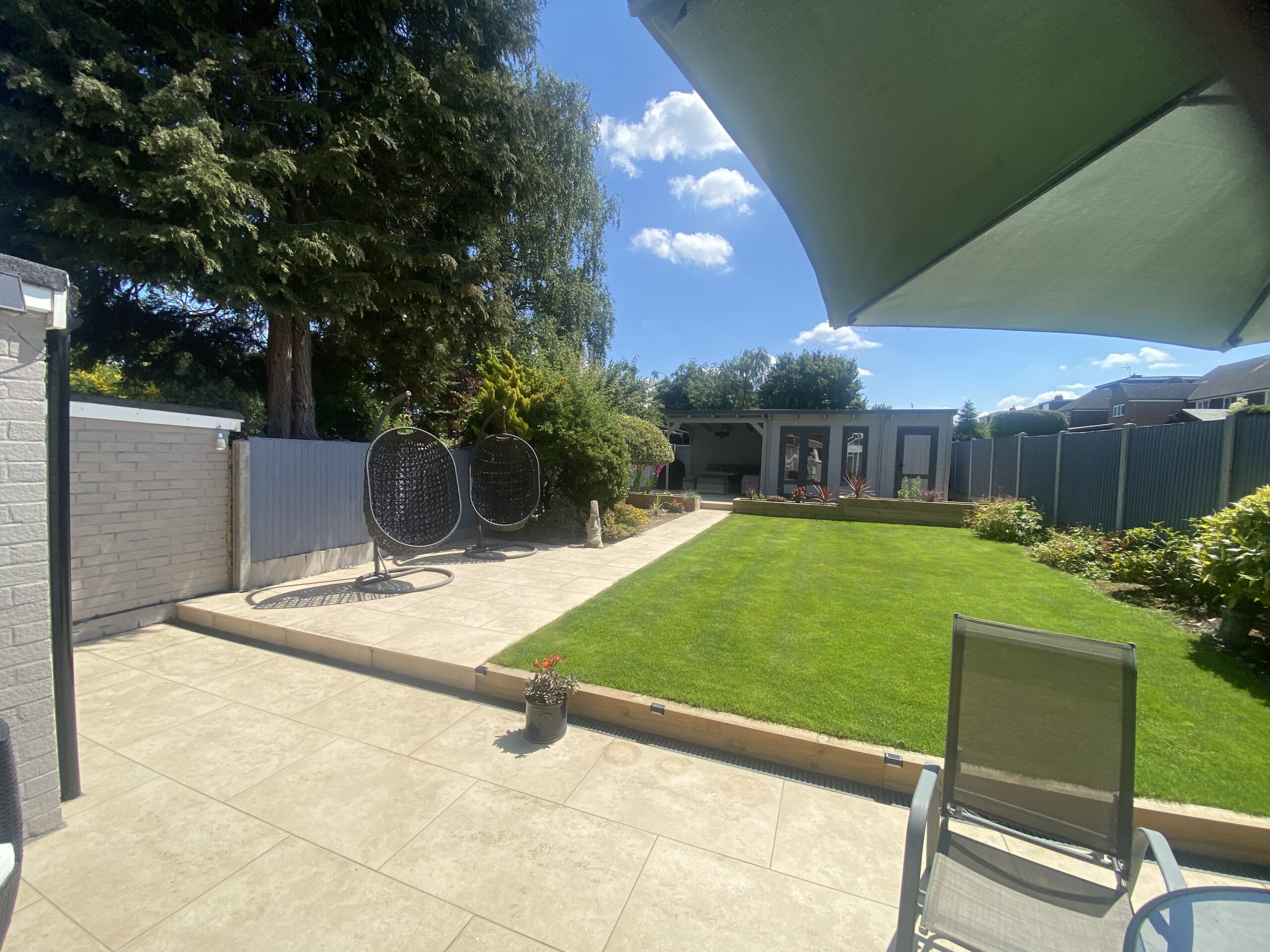 Patio installation in progress as part of a complete garden transformation