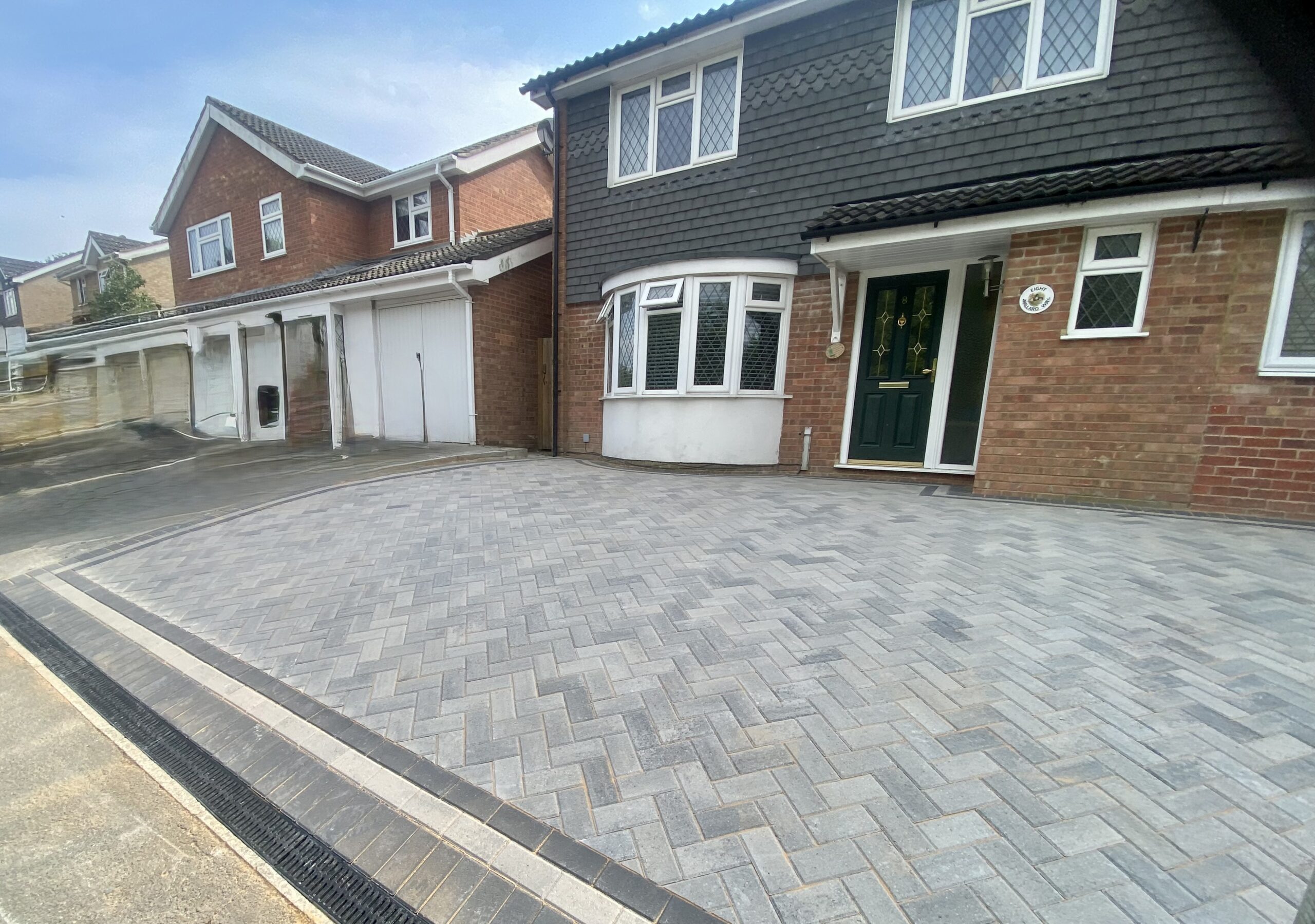 Grey block paving driveway with contrasting border in Maidstone