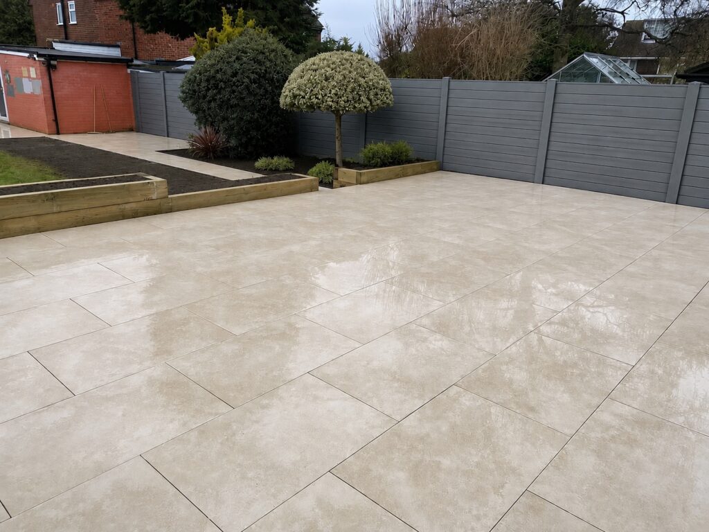 Modern garden transformation with porcelain patio and artificial grass in Maidstone